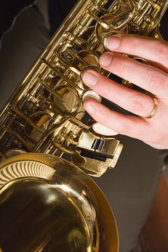 playing saxophone