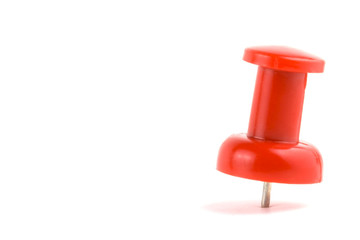 red thumb tack standing