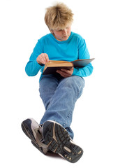 teenager boy reading a book