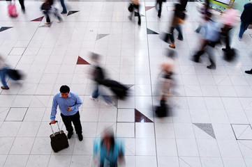 busy man deciding the way to go