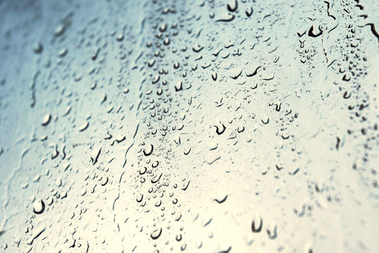 water after rain on the glass ( window )