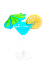 blue cocktail with lemon and umbrella