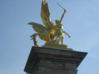 gold statue at pont alexandre-iii