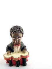 little kid playing drums