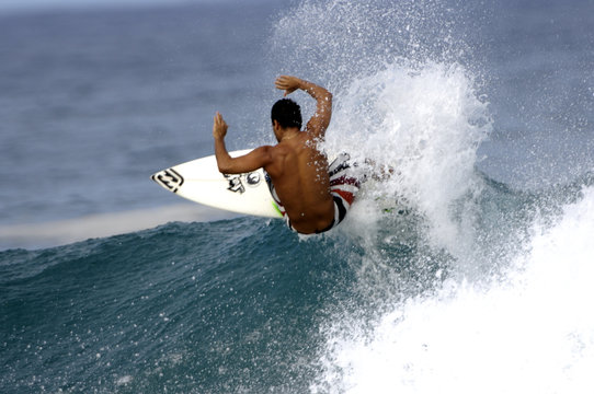 Surfer Doing An Off The Lip