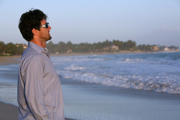 man walking on the beach