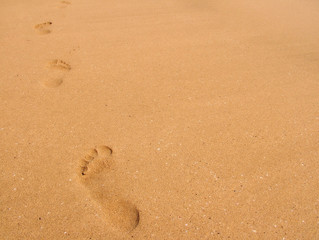 Fototapeta na wymiar footprints, walking in the sand