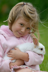little girl with a rabbit