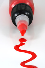red paint bottle