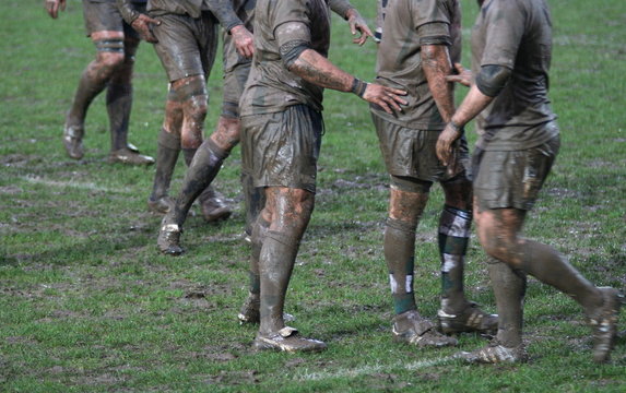 Muddy Rugby Plaers