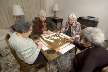 senior woman at the game table