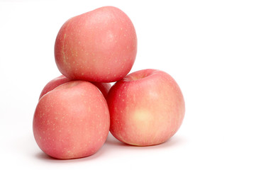 four pink apples