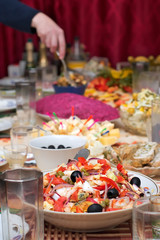 salad from seafoods with olives and vegetables