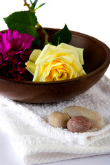 bowl, carnation and white towel.