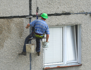 renovation worker on a block of flats