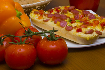 baguettes with pepperoni on the plate
