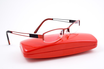 red glasses, specs, spectacles with red case - obrazy, fototapety, plakaty