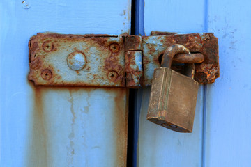 old rusted latch and padlock
