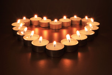 Fototapeta na wymiar heart of candles