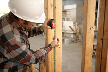 construction electrician measuring