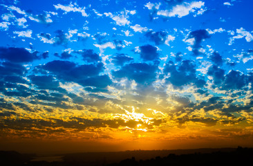 orange and blue sunset on beach