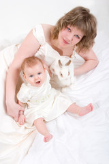 mother and baby with rabbit
