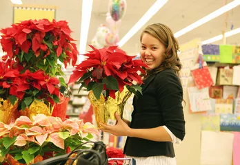 Foto op Plexiglas Bloemenwinkel vrouw en bloemen