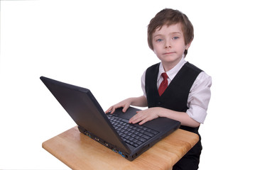 boy working on a laptop computer