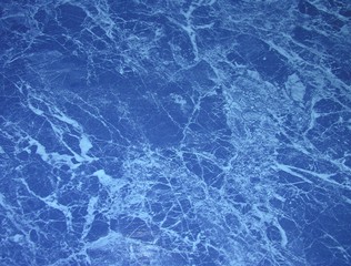 structure under a dark blue marble