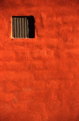 vent in red wall