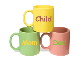 three colorful mugs - mom, dad, child (family)