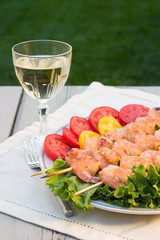 grilled shrimps and white wine outdoor
