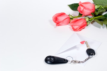 car keys and roses bouquet present