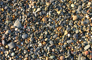 colorful beach pebbles, aberystwyth, wales.