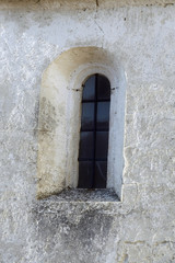 Fototapeta premium window on stone wall