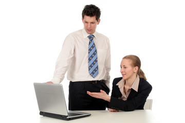 business couple working on laptop
