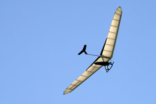 paraglider and blue sky - Powered by Adobe