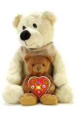 two teddy bears with sweet heart