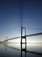 Rolgordijnen bridge over blue water © mema