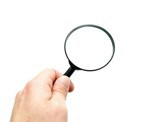 hand with magnifying glass