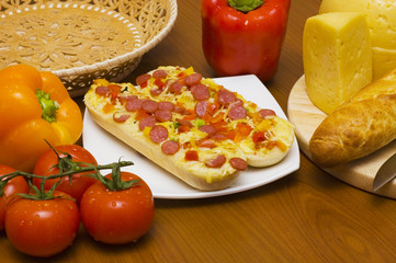 baguettes with pepperoni on the plate