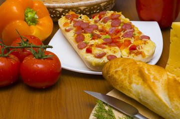 baguettes with pepperoni on the plate