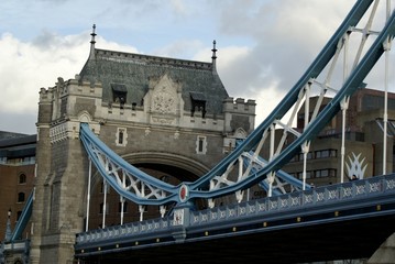 tower of london bridge with blue arch