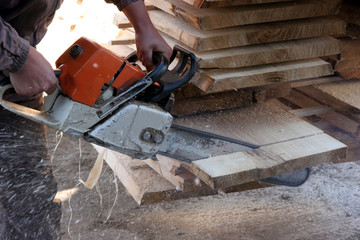 cutting with chainsaw