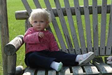 bruised baby on bench...