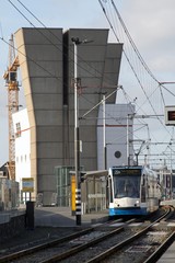 tram and ijtunnel towers in amsterdam