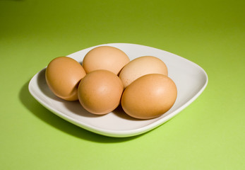 eggs on fresh green background
