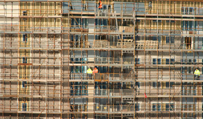 workers on scaffolding