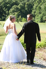 walk away bride groom tux dress gown black white