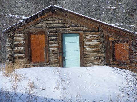 log cabin in winter